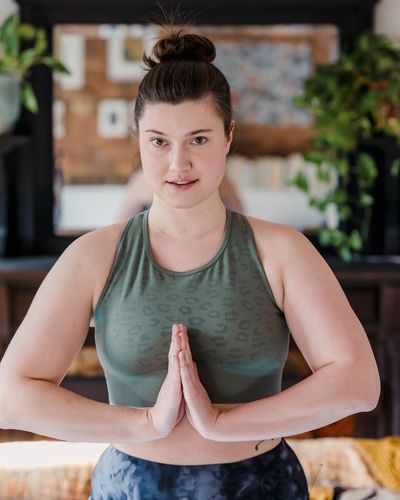 Person practicing focus exercises in a dark room